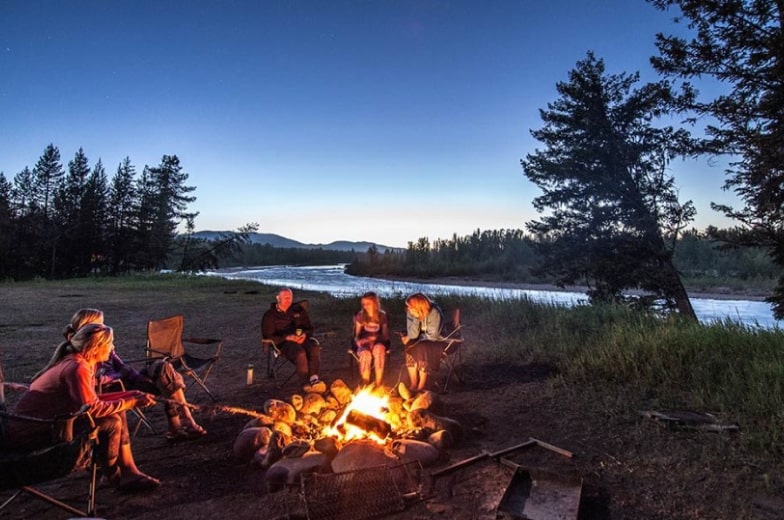 Campfire on the banks of the Flathead River with Wild River