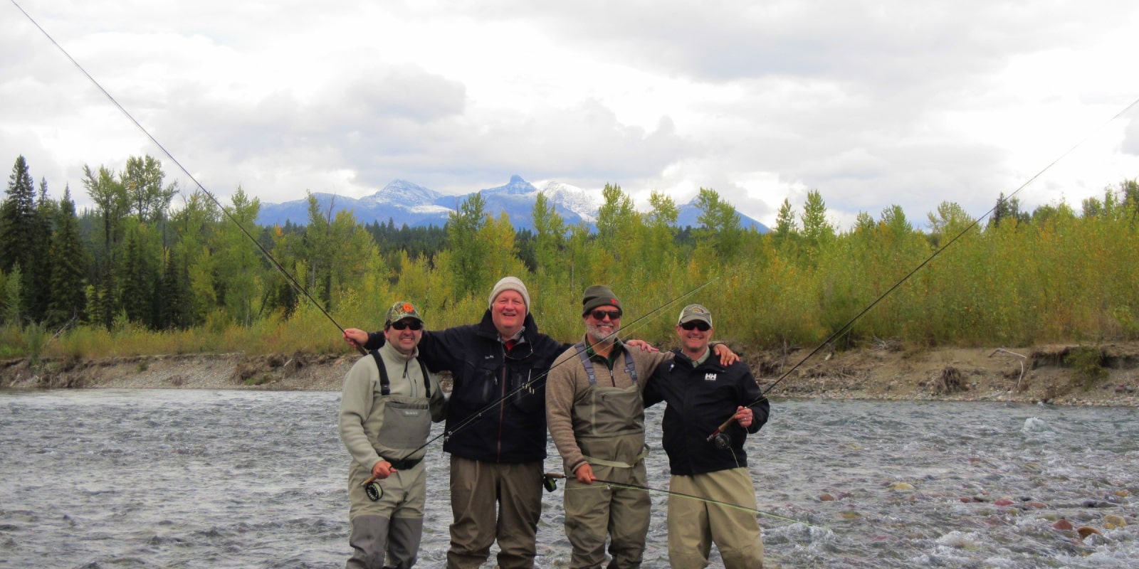 Group photo of smiling men after a Flathead River fly fishing trip