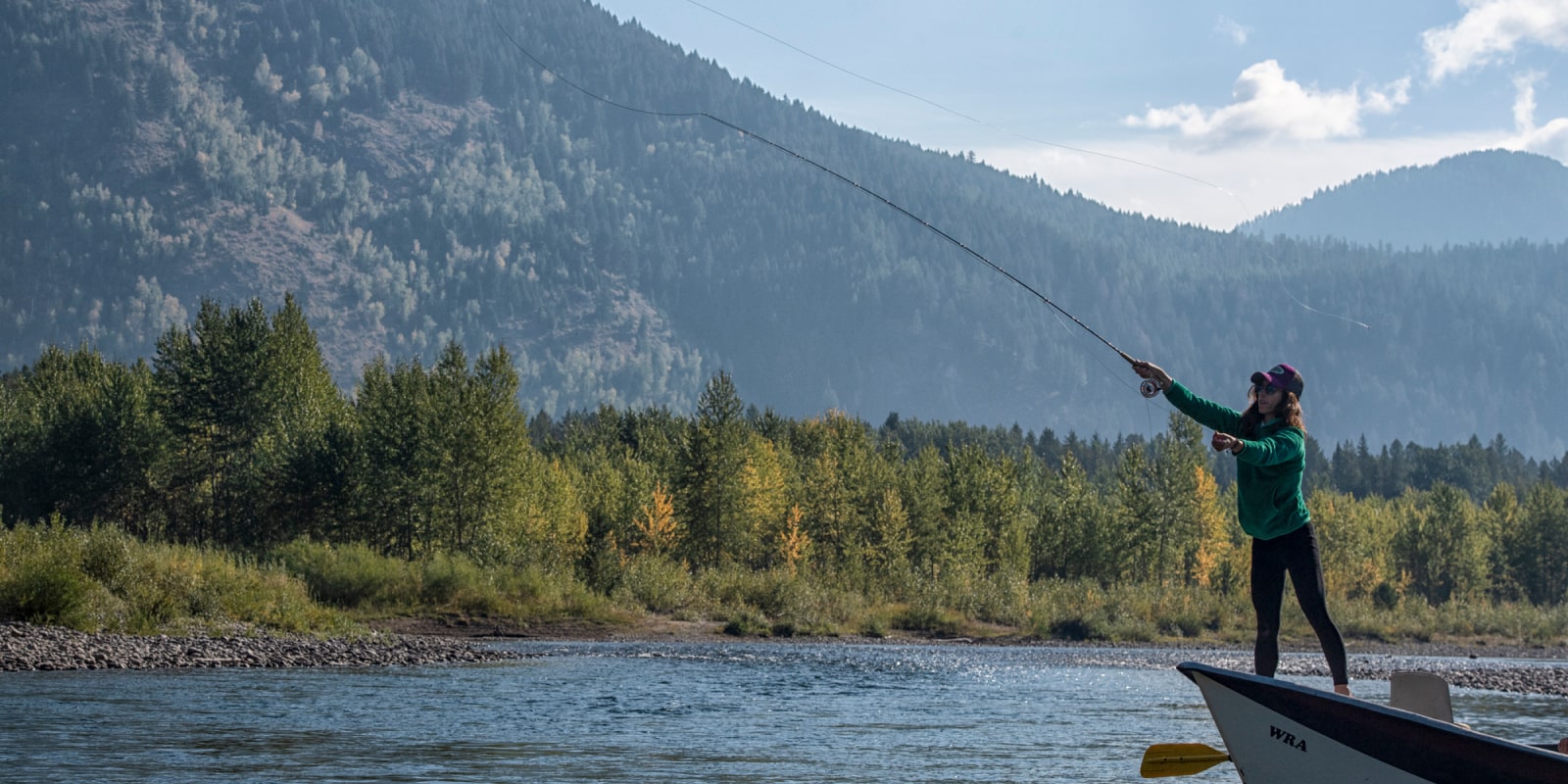 Woman casting on a fly fishing trip on the Flathead River