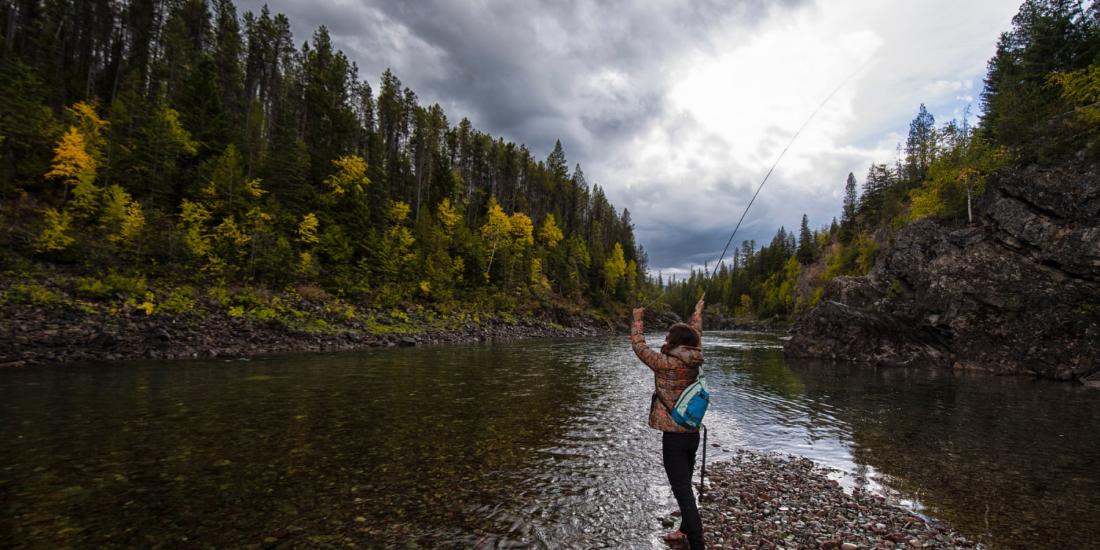 Young girl enjoying a multi-day fly fishing trip with Wild River