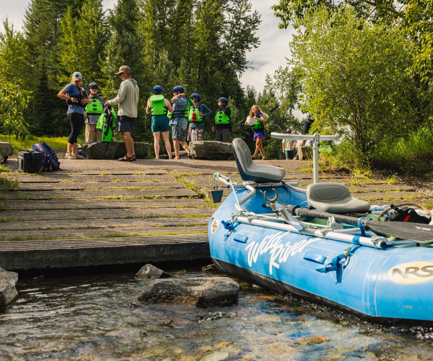 Gearing up for a whitewater rafting trip on with Wild River